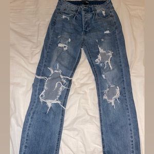 Fashion Nova ripped boyfriend jeans.